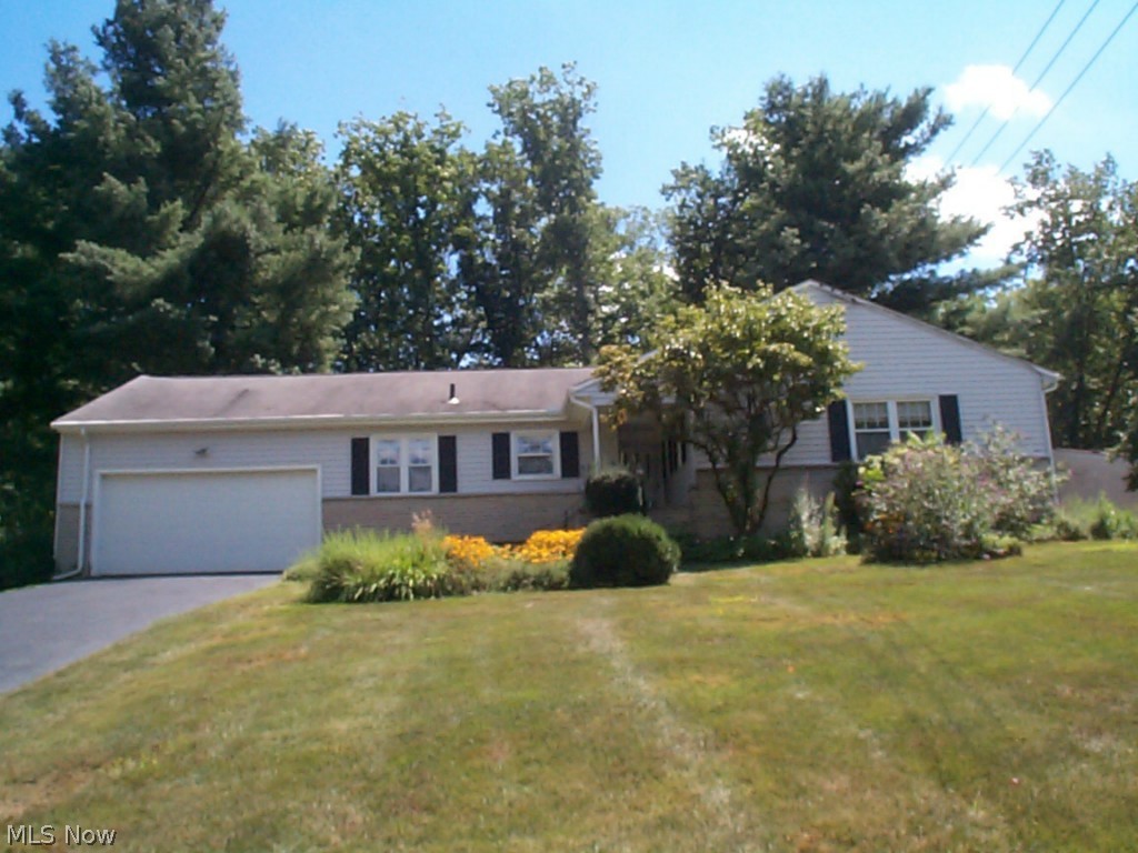 Wonderful ranch home on Metro Park setting. Beautiful refinished hardwood floors through out most of the home. Freshly painted interior. Large great room with fireplace overlooking rear yard, wooded park view. Kitchen includes an eating area and oak cabinets. New family room carpet. Large basement is part finished.