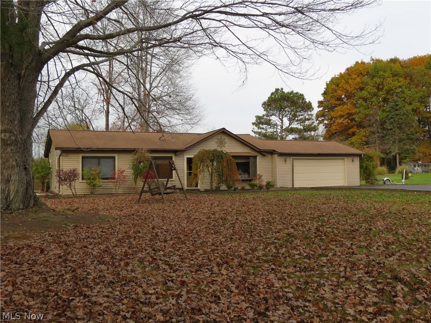 Welcome home to this beautiful 3 bedroom ranch, on a quiet street in Aurora!  Breathtaking views of Aurora Lake are among the many highlights of this 1 acre property.  A few steps into the path off your property takes you to metro parks conservation land.  Convenient first floor living!  Living room with huge bay window.  3 bedrooms, 1.5 bathrooms.  Newer carpet throughout!  Dining room with gorgeous hardwood flooring.  Large family room off the rear of the house features a wood burning fireplace -- perfect for those cold winter nights!  This well-kept home is priced to sell and won't last long! Many updates to home, too many to list!