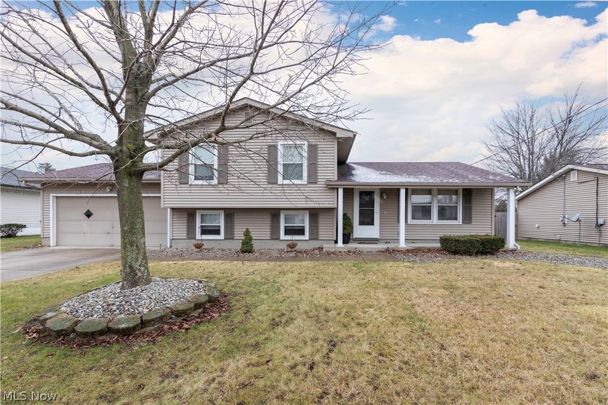 You just found your home! This beautiful and well maintained 3 bedroom 2 bath split level is located in the sought after Capitol Estates in the heart of Austintown. A huge living room leads into your beautiful eat in, oak kitchen, completely with a family friendly breakfast bar. 3 spacious bedrooms with plenty of closet space await you as well as a great updated full bath. The basement offers even even more living space as well as a clean laundry/utility room with ample storage. Many updates throughout the home including newer vinyl windows and recessed lighting. Convince abounds with a two car attached garage. The private backyard is fenced in with a large deck and fantastic fire pit area for entertaining. This home comes with a home warranty for a worry free purchase. Call today because this home will not last!