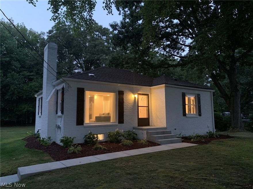 Beautiful home on a large lot near Rex lake! Close to Portage Lakes State park and the Ohio Erie Towpath. Has a newer kitchen with cabinets, stainless appliances, and concrete counter tops. Upstairs living room has vaulted ceilings with recessed lighting, a beautiful large viewing window, and a fireplace. Upstairs bathroom has recently been renovated and has a soaking tub with tile surround and recessed shelving - perfect for relaxing after a long day. Basement is finished and includes vinyl plank wood flooring, recessed lighting, and barn doors with a rustic vibe: would be perfect for a den, recreation room, or another living room. Downstairs bathroom is brand new with a large, roomy shower and recessed lighting.  In addition to cosmetics, the house has many updates such as a newer water heater, water softener, pressure tank, newer plumbing and fixtures, new AC unit in 2019, new roof in 2014, new back patio with metal roof as well. Agent owned.