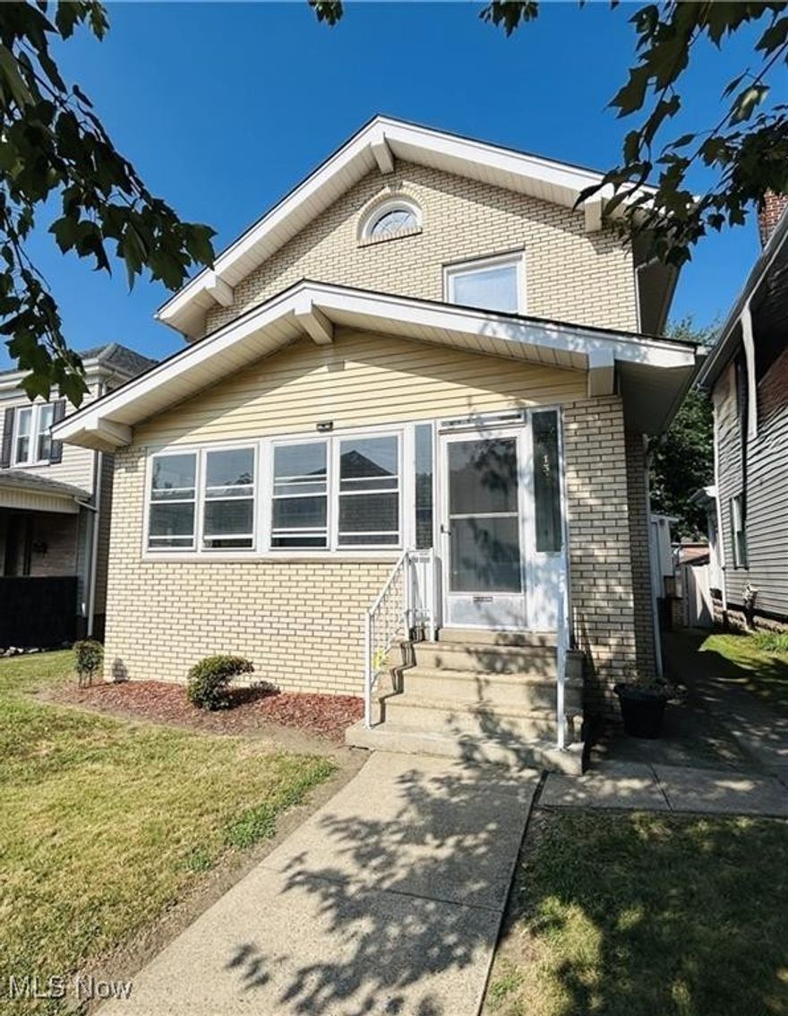 Spacious 4-bedroom brick home ready for its next chapter! Step into a welcoming entryway that leads to a large living room and a bright eat-in kitchen. The main level offers the convenience of a bedroom and full bath, while upstairs you'll find 3 more bedrooms and another full bath. The basement features a partially finished bonus room with a charming wood-burning fireplace-perfect for cozy evenings. Enjoy the seasons on the enclosed front and back porches, or take advantage of the one-car garage for added convenience. Located close to schools, parks, shopping, and more-this home truly has it all!
