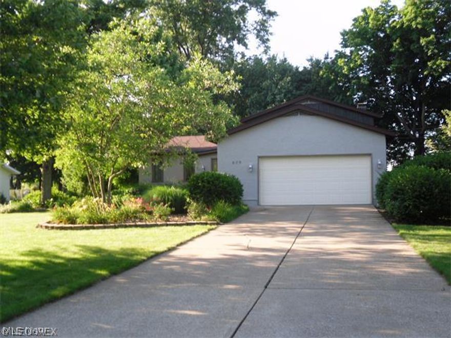 This home you must go inside to truly admire all the home has to offer. Split level with basement. Kitchen is very large with all oak cabinets, pull out drawers in the oak cupboards Has a large pantry as well. Wood floors thru out in entry way, kitchen thru to dining area. Patio off dining area. Dining area has a full wall china cabinet Basement is partically finished and it has a full four levels to this split level home. Picturesque yard with gazebo. This home has all the features you are looking for and much much more.