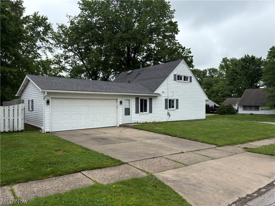 Come take a look at this beautifully remodeled 4-bedroom Cape Cod featuring stylish updates throughout. This move-in ready home offers new flooring, an updated bathroom, and a modernized kitchen complete with brand-new appliances. The inviting living room showcases a recessed fireplace accented by recessed lighting, creating a warm and contemporary feel. An oversized breezeway connects the kitchen to the attached garage, providing additional functional space and convenience.