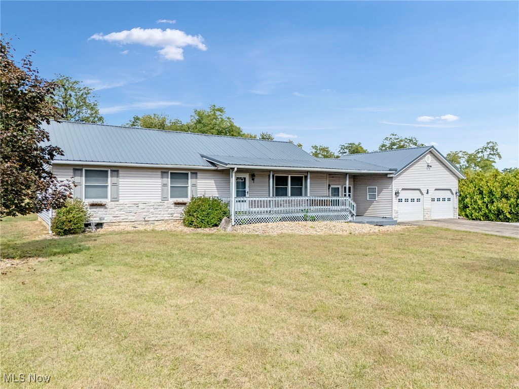 Are you looking for a stunning 3 bedroom/2 bath ranch home in East Knox LSD? This is the one!! This almost 2500+ Sq ft Ranch (1600 finished/1400 unfinished) home is located at the entrance of Apple Valley in the Orchard Hills Subdivision. Upon entrance into the home, you will walk into a spacious living room that is freshly painted! From the living room, you have a semi-open concept space that flows into the updated kitchen and dining with new stainless steel appliances. There is also a large mud room area and first floor laundry that can serve as a multi purpose room between the garage and home. You will also find new laminate flooring in the main living area, kitchen and dining area. In the rear of the home you have 3 generous sized bedrooms, one of which is the primary bedroom that has its own bathroom ensuite and and additional full bath down the hall for guests. Head out back to the very large backyard that cannot be built behind!! Some added bonuses of this house are the brand new features such as a the new Metal Roof, New Light Fixtures, New HWT, New AC Unit, New Furnace Humidifier, New Electric Panel, and SO Much More! One last thing to mention - this property gives the new homeowner access to the Private Indoor/Outdoor Pool, Beach Access and Boat Ramp Access. Schedule a showing today!