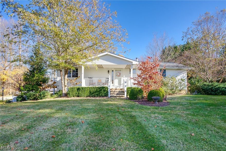 This lovely home is in a beautiful location on 1.5 acres of country charm. This home has 3 bedrooms, 2 full baths, 2 half baths,  a spacious living room, dining room, and cozy eat in kitchen. The back of the house has another living room and laundry room with wood beamed ceilings and many custom features. The wrap around deck and back patio offer plenty of room for entertaining and enjoying the quiet surroundings. The walkout basement with full windows would make a fantastic recreation room. There is also bathroom in the lower level open to the basement. This home has been meticulously cared for and has been a labor of love for the homeowners, who are relocating to be closer to family. Seller is offering a one year home warranty.