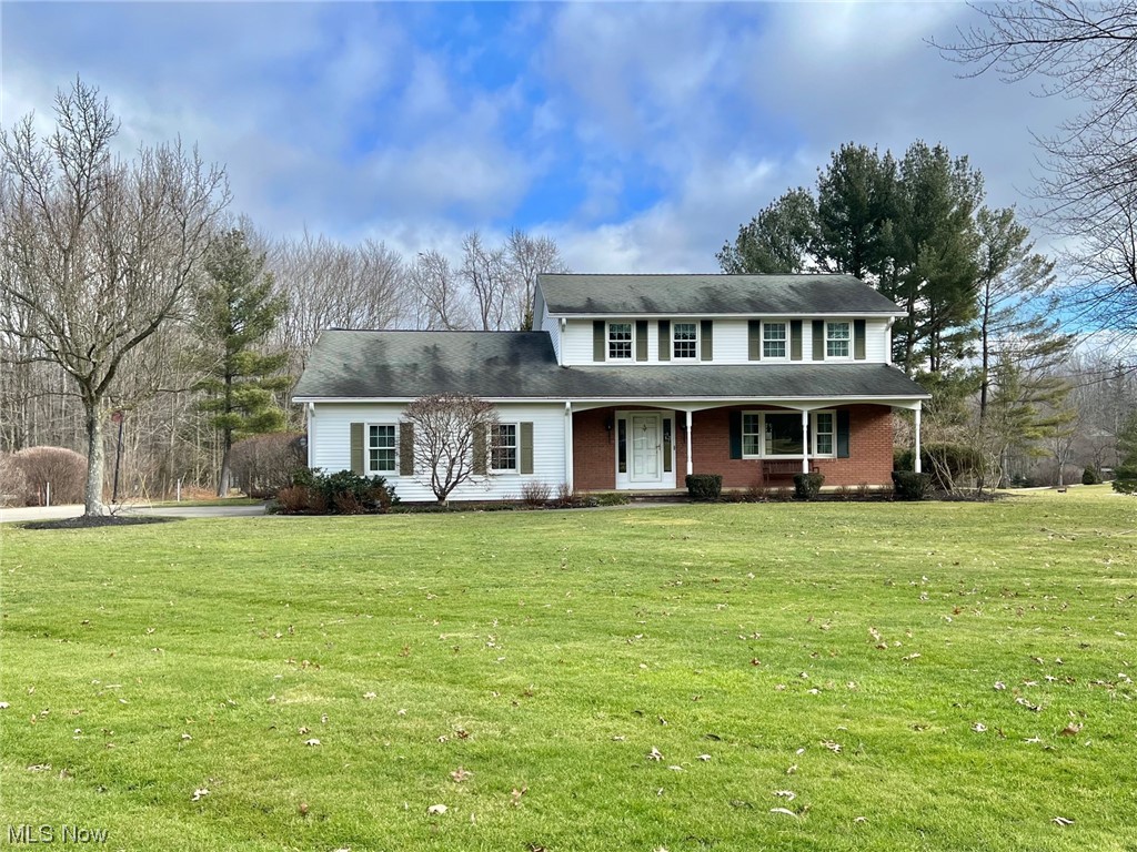 WELCOME HOME to this Beautifully Maintained 4 Bedroom & 2.5 Bath Classic Colonial set on 1.5+ Manicured Acres! This one-owner home offers great living space with over 2400 sqft & desirable traditional floor plan. Covered front porch welcomes you into the slate foyer entrance. Bright and light Great Room addition with vaulted tongue & grove wood beamed ceiling, wall-to wall windows, slate/carpet flooring, built-in entertainment center & walk-out to deck. Formal Living & Dining Rooms have original hardwood floors. Eat-in Kitchen with wood floors, all stainless steel appliances stay & deck access. Warm and inviting Family Room with wood burning fireplace & built-in bookcases. 1st floor half bath. All 4 bedrooms on second level including large Master Bedroom with private bath and 3 additional bedrooms with full bath to share. Full unfinished basement includes laundry & storage area. Vinyl windows. Professionally landscaped yard with blue stone patio, walkways & expansive deck overlooking deep backyard. Concrete driveway with 2+car attached garage. Well water & private sewer, no septic. This wonderful home is ready for a new family to make it their own! Set on quiet cul-de-sac street, close to Chardon Square, shopping, restaurants, schools and just minutes to freeway access! Immediate Occupancy!
