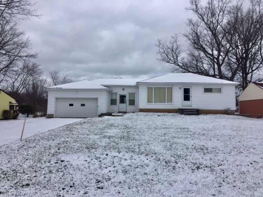3 bedroom, 1 full bath Ranch Home with 2 car attached garage with breezeway and full basement.  Central Air.  Backyard overlooks large grassy area of school.  Great opportunity with super location.