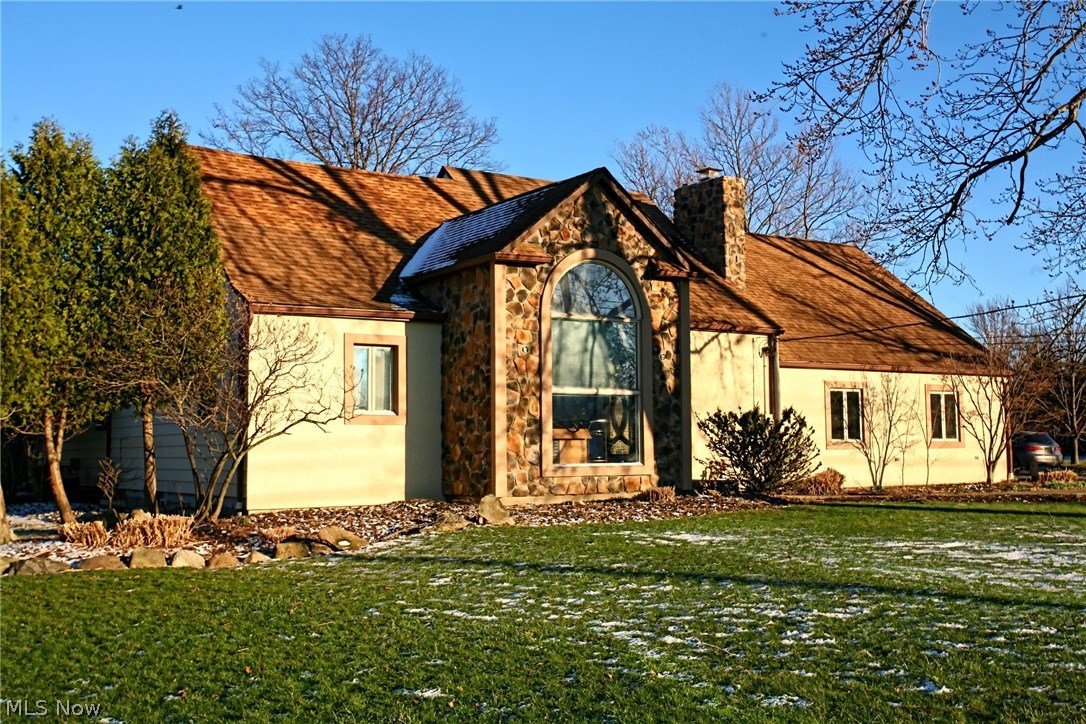 This fabulously remodeled home features 3 bedrooms, 2 full bathrooms, and is located in the city of Highland Heights, Ohio. New roof, new driveway. New designer glass double front doors lead to the gorgeous foyer. Formal dining room with fireplace. Wonderful kitchen with rare granite countertops and high-end stainless steel appliances. Large open living room with vaulted ceiling, fireplace, new wet bar with granite countertops, and a spiral staircase leading to the loft area plus a huge attic. Updated master bedroom with hardwood floors, a new closet with mirrored doors, and the updated master bathroom with a custom granite countertoped vanity, tile flooring, and an amazing Jacuzzi tub/stem shower with 42 jets. Heated 3 car attached garage. Huge front and back yard. New plumbing. Updated electrical and outlets. 2 A/C units. 2 furnaces.