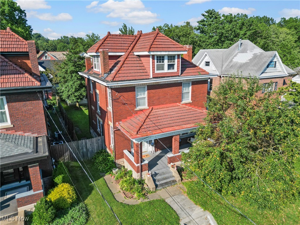 Step into history with this beautifully preserved 1910 home in one of Parkersburg’s most desirable neighborhoods, just steps from City Park. Featuring 4 bedrooms, 2 baths, ornate fireplaces, and original woodwork, this home blends timeless charm with modern updates like new stainless appliances, fresh upstairs carpet, and updated gutters and downspouts.
Enjoy three bedrooms plus an office on the second floor, and a finished third floor perfect as a fourth bedroom or flex space. Outside, a covered porch with swing, your own apple tree, a fully fenced backyard, and a detached garage create the perfect setting for relaxing or entertaining.
All this in a community known for its tree-lined streets, holiday displays, and even the occasional Saturday morning parade.