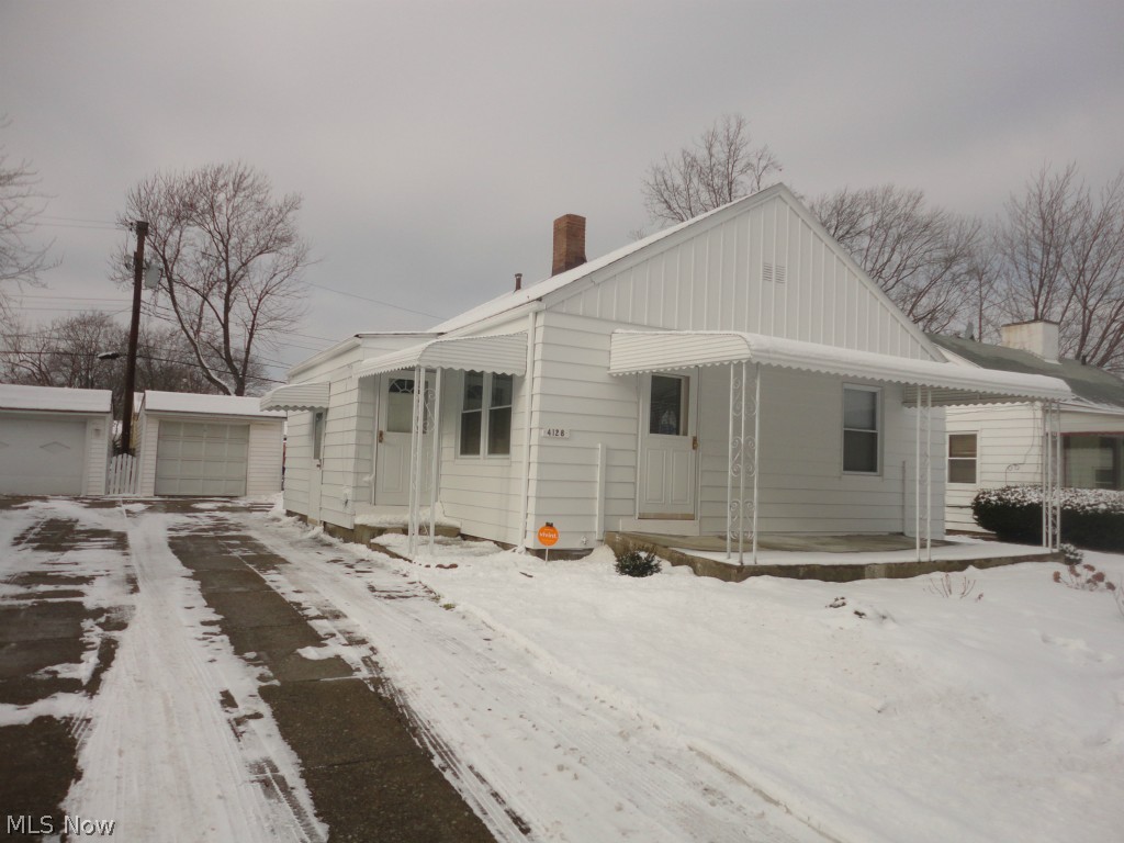 Wonderful starter very clean 2 bedroom ranch with a dry basement and a dry bar and much storage-fruit cellar area.. Updated bath-2009 including GFI'S, newer furnace and hot water-2010, the basement also has a work bench area-as well as a 200 amp service and some new plumbing. All appliances stay. Front covered patio. Attic access with insulation. Security system will not stay with the home! Home warranty also!!! Move right in. Close to Freeways, medical facilities and Shopping Etc.