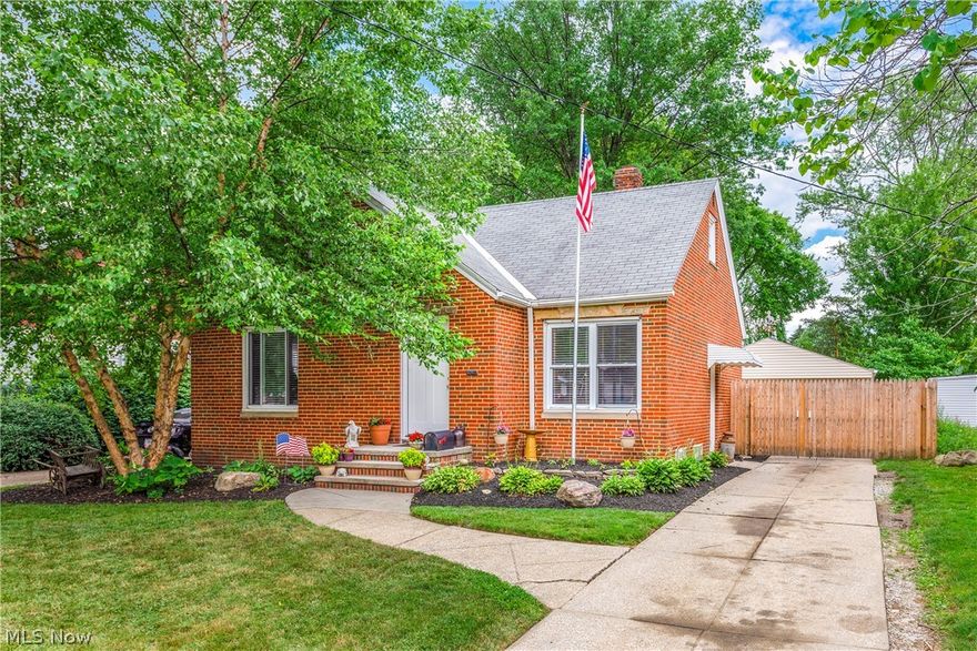 Brick Bungalow has been freshly updated while still maintaining the charming characteristics of the 1950's architecture. Large picture window and freshly painted walls keeps the living room bright and sunny. Updated kitchen has quaint B-board accent wall, concrete countertops and stainless appliances. Sliding doors lead to deep back yard. Two bedrooms on 1st floor plus remodeled main bathroom completed 2016. Hardwood floors throughout. Second floor is ideal for master suite. Angled ceiling create a dormer ideal to curl up on a chaise and relax. Industrial feel is created in the lower level rec room with exposed painted ceiling. Full bathroom with step in shower redone 2021. Pristine floors and walls, new utility tub and generous storage. Don't worry about the price of wood, this fully fenced back yard is completely encircled by 6 ft wood privacy fence. Heated & insulated 2.5 car garage with additional rear garage door, new gas line and 220v electric. Major improvements: interior paint