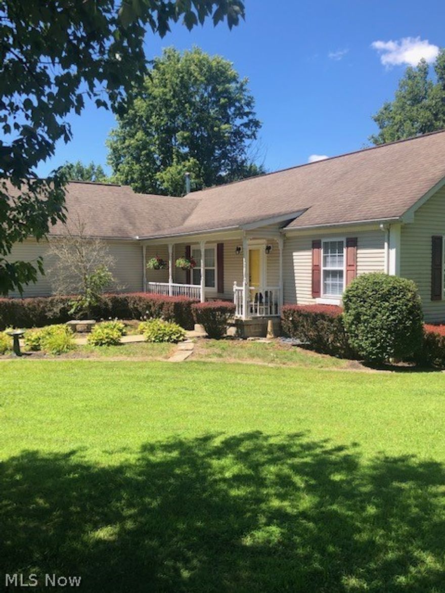 Cul-de-sac location with 1.05 acres of beautiful ground, mature trees, two paved driveway areas, shed, two level deck with hot tub on upper deck from bedroom.  Home has been freshly painted in a beautiful neutral color with bedrooms showing new neutral light gray carpeting.  The entrance foyer and great room have warm toned laminate wood floors, bathroom and kitchen are ceramic tile, stainless steel appliances, the master suite is spacious with French doors, large master bath that offers two closet areas, laundry can be located on first floor or basement area, new garage door, new smoke alarm, new outside lights in front, the basement is a full 1,508 sq. ft. with walkout door and wood burner.  Basement could be finished into more living space.  This home truly offers convenience to interstate while at the same time you can enjoy beautiful evenings on your deck away from the busy life!