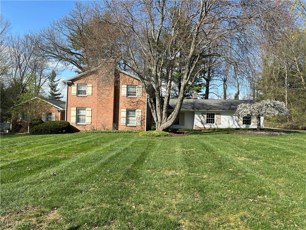 Imagine living in a fabulous Colonial in the stately Pembroke Neighborhood on a double lot! This well-built home by John Weber provides maximum space for your living needs. Everything is oversized from the Garage to the Family Room, the Living Room, and the Great Room. The kitchen was updated in 2003 by Bolon's Kitchens and features Mouser Custom Brand Cabinetry, Granite countertops, and Blue Ridge Hickory engineered hardwood floors. The island holds the range top and many drawers for kitchen utensils, pots, and pans! From the kitchen walk to a connector room to the large Great Room which could be a Studio, Primary Bedroom, or large office. With vaulted ceilings, track lighting, and many windows, this room offers bright lighting on any Ohio day. The Great Room also has a full double sink bathroom with a stackable washer/dryer unit. A brand-new bathroom joins the 4 bedrooms upstairs with tub/shower combo. The Primary Bedroom also has its own bathroom with a new vanity. The large, unfinished basement has plenty of room for storage or play. Think multi-generational and especially with the separate entrance to the basement. The outdoor spaces feature several patios with seating areas and lush landscaping. You can listen to the birds and enjoy the screened-in porch when the weather warms up. Neutral paint in most rooms. Roof on main house is approximately 6 years old. Roof on Great Room addition is about 20 years old. 2 furnaces, 2 A/C units, 2 water heaters. Auditor indicates 2 full baths and 1 half bath, but Seller states 4 full baths and 0 half baths.