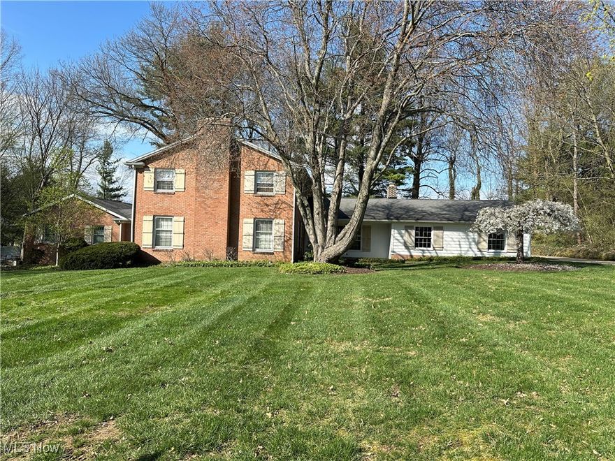 Imagine living in a fabulous Colonial in the stately Pembroke Neighborhood on a double lot!  This well-built home by John Weber provides maximum space for your living needs.  Everything is oversized from the Garage to the Family Room, the Living Room, and the Great Room. The kitchen was updated in 2003 by Bolon's Kitchens and features Mouser Custom Brand Cabinetry, Granite countertops, and Blue Ridge Hickory engineered hardwood floors. The island holds the range top and many drawers for kitchen utensils, pots, and pans! From the kitchen walk to a connector room to the large Great Room which could be a Studio, Primary Bedroom, or large office. With vaulted ceilings, track lighting, and many windows, this room offers bright lighting on any Ohio day. The Great Room also has a full double sink bathroom with a stackable washer/dryer unit.  A brand-new bathroom joins the 4 bedrooms upstairs with tub/shower combo. The Primary Bedroom also has its own bathroom with a new vanity. The large, unfinished basement has plenty of room for storage or play. Think multi-generational and especially with the separate entrance to the basement. The outdoor spaces feature several patios with seating areas and lush landscaping.  You can listen to the birds and enjoy the screened-in porch when the weather warms up. Neutral paint in most rooms.  Roof on main house is approximately 6 years old.  Roof on Great Room addition is about 20 years old. 2 furnaces, 2 A/C units, 2 water heaters. Auditor indicates 2 full baths and 1 half bath, but Seller states 4 full baths and 0 half baths.
