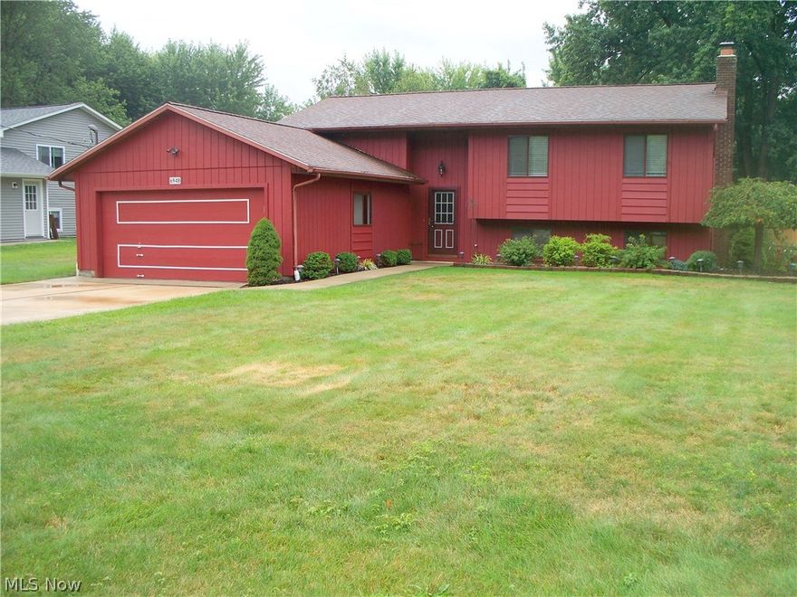 Enjoy Lake Erie breezes in this large bilevel boasting 4 bedrooms and 2 full baths / Kitchen with breakfast bar, nice cabinets, all kitchen appliances, ceramic back splash and wonderful pantry with swinging shelving / Spacious formal living room and dining room / Dining room has access to deck which overlooks a nice back yard with shed / All three bedrooms on first floor have newer carpeting and the master bedroom features a pocket door to the full bath / All doors on first floor are solid wood / The lower level 22x21 family room is wonderful for entertaining or just hanging out—cedar siding, brick fireplace with wood burner stove insert, wet bar, new wood blinds and newer carpeting / Lower level also has the 4th bedroom, a full bath and very large laundry room with utility sink, cabinets and ceramic floor--washer stays / There is a newer concrete driveway with drain and newer sidewalk / Pea gravel around entire foundation to with 6” of ground / Waterproofed lower level plus new drain