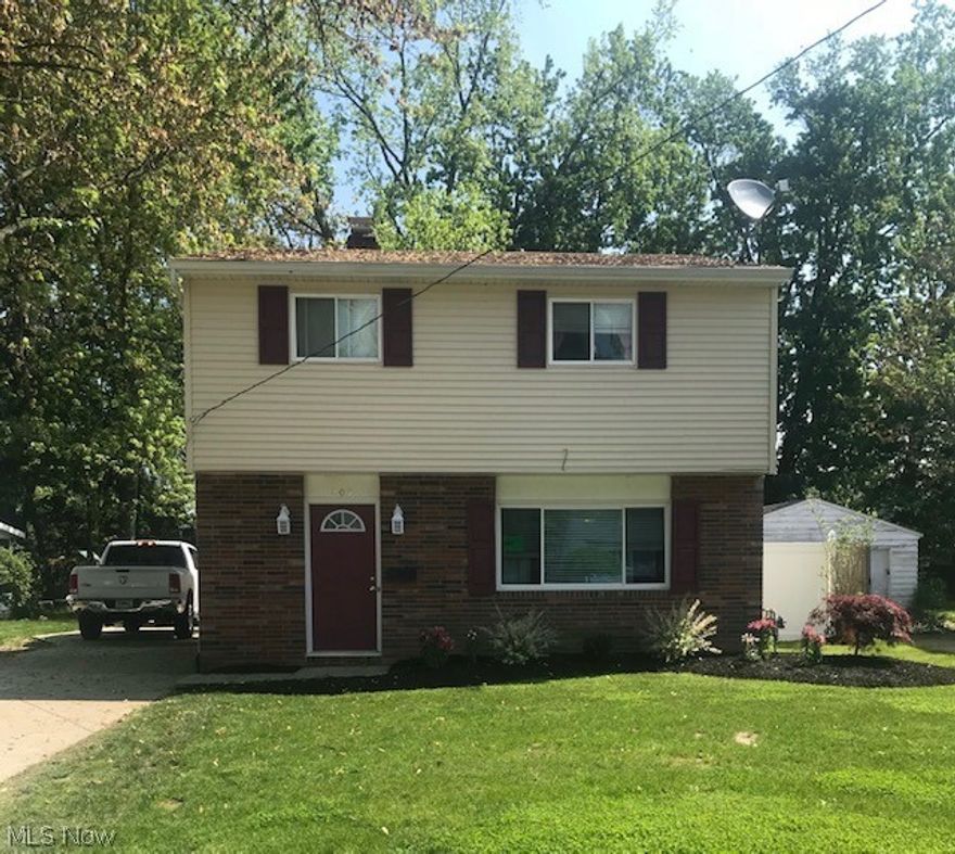 Great Eastlake Colonial ready to go! Large family room with wood burning fireplace. Updated eat in kitchen with ceramic flooring, newer cabinets and all appliances. Nice sized bedrooms. Updated full bathroom with new flooring, tub surround, vanity and fixtures. Newer siding, gutters, exterior doors, stamped concrete patio, electrical, furnace, ac, hot water tank and more. Heated 1 car detached garage. Great location! Seller is motivated!