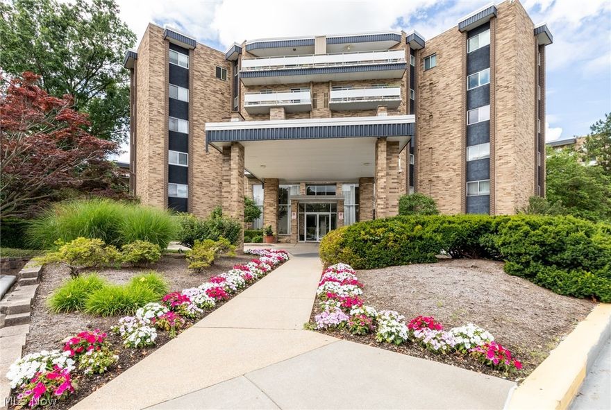 Spacious second floor unit in Acacia on the Green with newer Luxury Vinyl Plank flooring throughout! Entry foyer has a wall of closets for great storage! Open floorplan includes combination Living and Dining room, perfect for entertaining! Kitchen with easy to maintain LVP floor has breakfast bar, all white cabinetry with pantry, and newer appliances including gas range. Spacious Primary suite offers ample closet space and en-suite Half Bath. Second Bedroom with full Bath in hall has shower over tub. Beautiful Balcony views of the courtyard for your year round enjoyment. Acacia on the Green offers tremendous amenities including underground parking with garage space at $50.00 per month; 24/7 security, fitness room, Social Room and amazing swimming pool recently renovated with grills! PICKLEBALL courts for your enjoyment! Monthly fee includes cable with free Showtime, ESPN, Disney, Hulu, HBO Max, Peacock, Paramount Plus and AMC! Great location directly next to Acacia Reservation of the Cleveland MetroParks, convenient to Beachwood Place/LaPlace and Legacy Village. Easy access to highway.