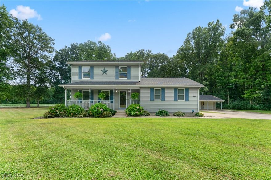 Discover the perfect blend of privacy, comfort, and functionality in this beautifully maintained Colonial situated on 1.17 acres in Lordstown. Offering 3 bedrooms, 2.5 bathrooms, and over 1,400 sq. ft. of living space, this home is designed with both everyday living and entertaining in mind.
Inside, the main floor features a welcoming living room with abundant natural light and seamless flow into the updated kitchen. The kitchen boasts granite countertops, white shaker cabinetry, stainless steel appliances, and a stylish tile backsplash, with an adjoining dining area that opens through sliding glass doors to the backyard. A convenient half bath and access to the attached garage complete the first floor.

Upstairs, the primary suite includes a walk-in closet and access from the primary suite to the bath with a granite vanity. At the same time, two additional bedrooms have separate access to the full bath, providing comfortable accommodations for family or guests. The finished basement expands the living space with a large recreation room and additional full bath, perfect for game nights or a home theater.

Outdoors, you’ll appreciate the large, tree-lined lot that offers privacy and plenty of room to roam. A welcoming front porch, spacious backyard, and long driveway set the stage for country-style living with modern convenience. Car enthusiasts, hobbyists, or those in need of storage will love the oversized attached two-car garage plus an additional detached two-car garage.

Located on a quiet cul-de-sac yet just minutes from schools, parks, and major routes, this property combines a peaceful setting with accessibility.