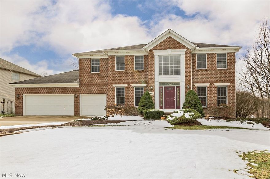 Welcome Home to 7117 Longview. From the minute you walk in the two story foyer of this beautiful colonial home, you will have a warm and welcoming feeling. This 4 bedroom, 2 1/2 bath home is spacious and easy to move right into. The kitchen area is open to the family room and has large windows, built-ins and a gas fireplace. A great place for the family to enjoy. The large mudroom is off the garage, perfect place for kids to drop their bags from school!! The lower level is truly special. It is a huge finished space, with Amish built book shelves and wet bar that houses a wine refrigerator  and a mini refrigerator. This home has great space, neutral finishes, and in a fantastic neighborhood. You won't want to miss this opportunity to have it all!!