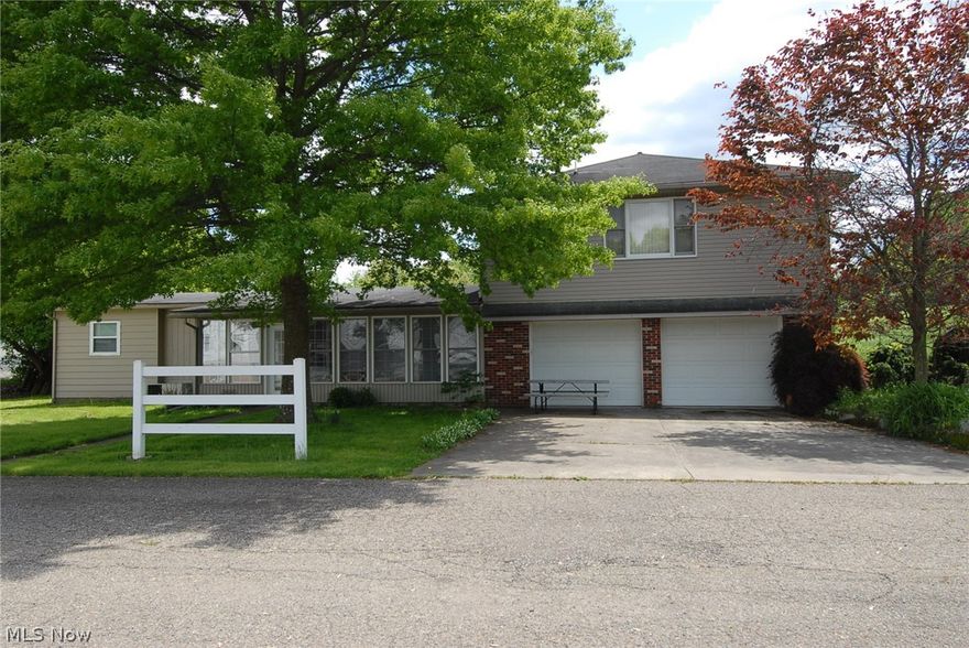 Located in the heart of Dresden, this well maintained 1888 square foot home has much to offer!  As you enter the home through the enclosed porch you are greeted by a large open living/kitchen/dining area perfect for entertaining. The kitchen features newer KraftMaid cabinetry, counter tops and vinyl flooring.  An addition has been added with a two car attached garage with an amazing master suite above that includes a separate HVAC system, full bath, high ceilings complete with a sky light.  The three outbuildings are included with the property.
The property next to the home with the mobile home and garage will be available in the future once through probate.
Don't miss your chance on this one!