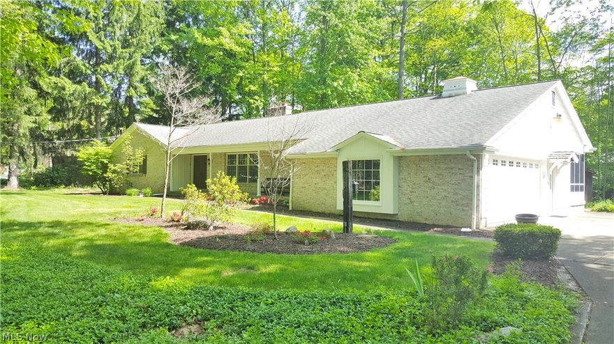 Well maintained ranch home with gorgeous parklike setting. This home offers 3 bedrooms and 2.5 bathrooms. Large living room with newer bamboo wood flooring and crown molding that opens up to the formal dining room with a new light fixture, bamboo flooring, and built-in cabinets. Cozy family room with hardwood flooring, cathedral ceiling, fireplace, and bay window overlooking the beautiful backyard. Huge eat-in kitchen with hardwood peg flooring, built-in appliances & abundant cabinets plus reverse osmosis to sink & refrigerator. Stunning master bedroom with brand new carpet and paint, remodeled master bathroom, and plenty of closet space. Two additional nicely sized bedrooms. Main bathroom has new countertops and walk-in shower. Full DRY basement includes newer 92% efficient furnace & A/C in 2003 and 50 gallon hot water tank in 2008. Interior also features Pella double pane windows & paneled doors. Updates include: most lighting fixtures replaced throughout, newer flooring throughout m