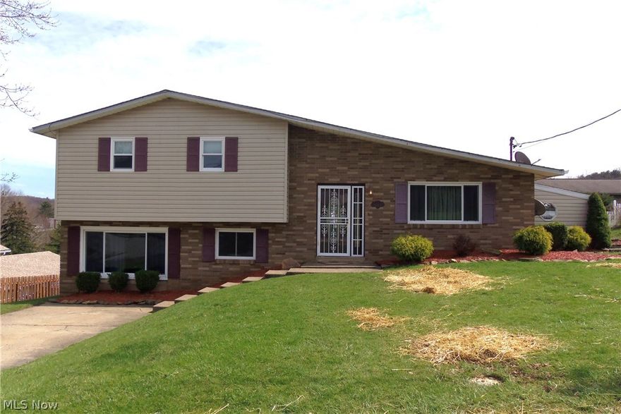 238 Hideaway Acres Road welcomes you and your family to the comfort of this 3 BR, 1.5 bath home that’s just a few minutes away from Tomlinson Run State Park.   This multi-level house offers a spacious yard with .32 acres and a full 2 car garage.  Enjoy a dip in the 12X20 heated pool at the end of your hard working day or relax in the large game room. This home includes a newly painted living room with vaulted ceiling and stone fireplace.  Includes newer windows, ceiling fans on every level, central air, stainless steel appliances and newly insulated for warmth.