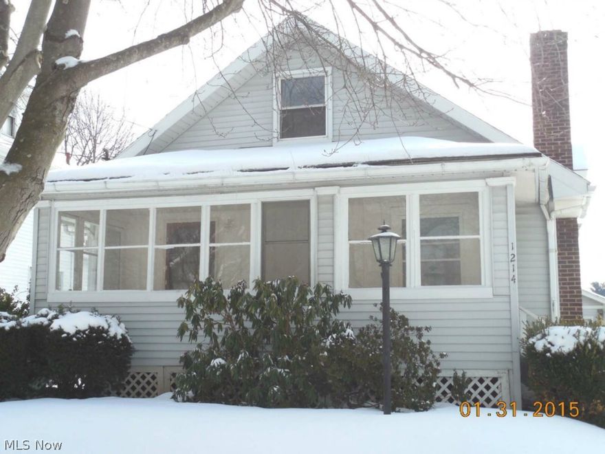 Spacious colonial style home with an enclosed front porch.  Great enclosed front porch.  Large foyer, woodburning FP in the living room with a built in cabinet.  Formal dining room, eat in kitchen, 3 bedrooms plus a bonus/mud room.  Detached one and a half car garage.  Lots of potential.  Call today for a private showing.