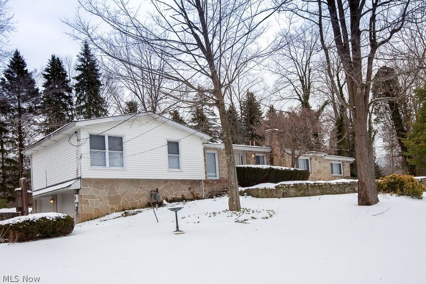 Regal, refined, romantic, the crowned jewel of Logan Way is nestled on 1.7 picturesque ares. This incomparable spacious 5 bedroom 2.5 bath dream home features a custom cherry kitchen, and custom cabinetry throughout, this one of a kind masterpiece was designed for maximum function. Call for your private showing, because you deserve it. A rare find and price!