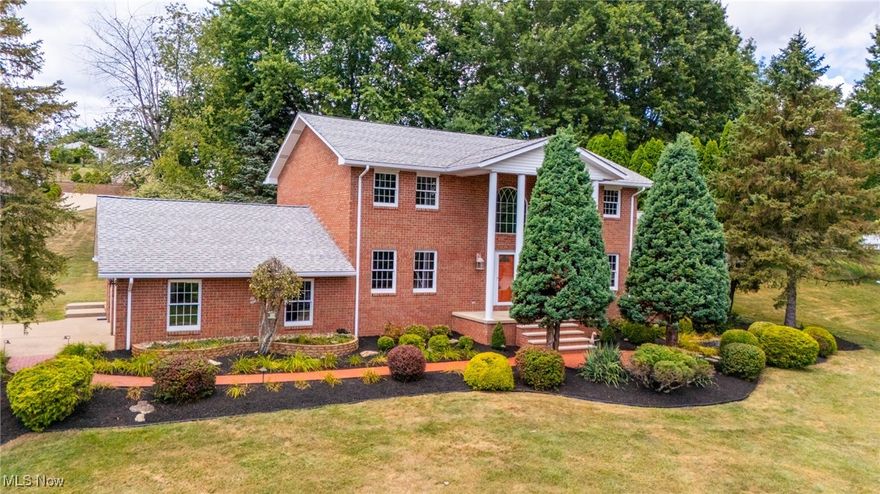 This beautiful 2 story, 4 bedroom brick home offers master crating through out. 4,658 sq. ft. of living space. Large custom kitchen with appliances and breakfast bar, 3 baths, finish basement with rec room, easy living patio, spacious formal dining room with surround sound,and  beautiful  hardwood floors all on a .4 acre on a corner lot. So much more to see at $659,000.