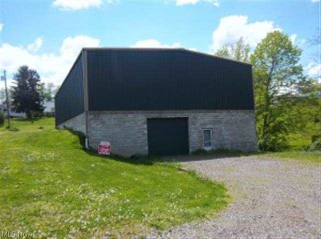 UNUSUAL FIND! Huge 50x80, 2 story (8000 SF app.) steel and block building includes approx. 5 acres of ground that has been subdivided into 19 lots in Follansbee. So many possibilities.