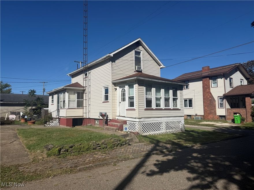 2-bed, 2-bath home on an alley bound lot on a quiet street in town. This property features a concrete driveway for off-street parking, a patio, as well as an enclosed front and back porch.