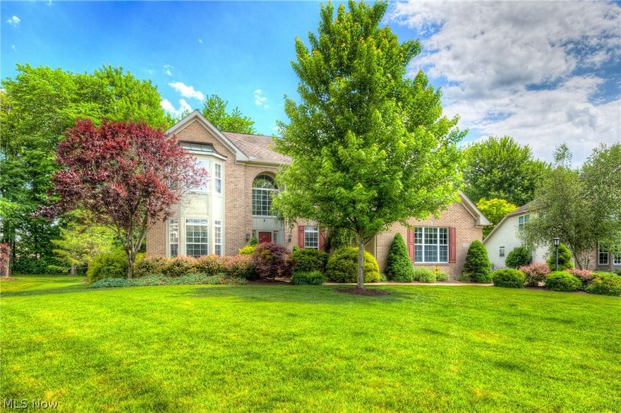 Gorgeous four bedroom colonial on a quiet cul-de-sac in the Lakes of Aurora community!  Two story foyer with hardwood floors flanked by formal LR/DR and office with French doors and elegant architectural features.  The rear of the home has a fabulous open floor plan with high ceilings,  two story great room with FP and huge gourmet double island kitchen with tons of natural wood cabinets and slider leading to the rear grounds.  A little slice of heaven, the private back yard has a colored and stamped concrete patio and majestic Koi pond/waterfall water feature!  First floor master with glamour master bath including double sink vanity, Jacuzzi tub, shower and walk-in closet.  Ascend the circular staircase to the second floor which boasts an expansive loft/family room, three additional bedrooms and two full baths.  The real gem of the home is the lower level with about 1300 finished sq ft including a fourth full bath, portable fireplace, huge rooms with billiard area, and a custom wet ba