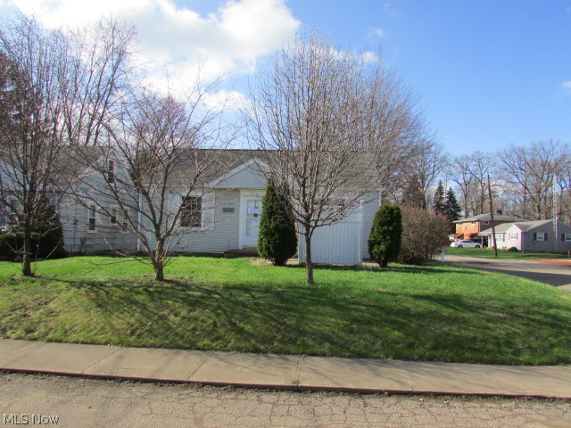 Nice bungalow with an updated kitchen featuring an open ceiling with beams. There is a partially finished basement. Additional attic space can be finished to make another bedroom or more living space. A detached garage. Corner lot located in a quiet neighborhood. Property sold AS IS.