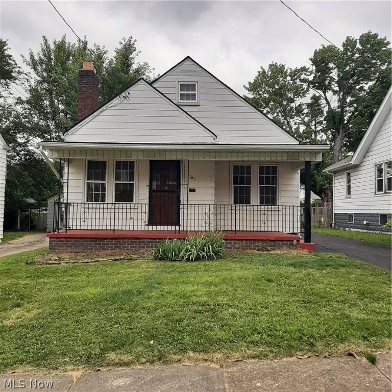 This affordable home is in move-in condition and ready for a new owner. The fresh paint throughout looks outstanding in the natural light. A beautiful seating area with lots of windows is a great place to start your day. A spacious living room is made even more inviting with its fireplace. 2 main floor bedrooms allow convenient first floor living. A large, insulated attic can be used for storage or even finished for additional living space. The basement offers ample additional space including another half bath. The electrical panel has just been replaced as well as the roof. For additional peace of mind, the Sellers are providing a free one-year home warranty to the Buyer.