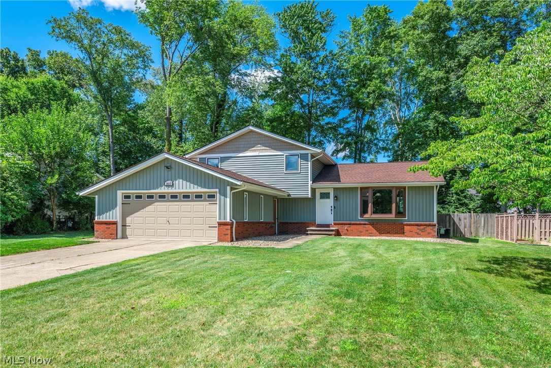 The Wow factor begins the moment you walk in the front door & continues throughout the entire house. Almost every inch of the home has been redone. Entire interior painted, new baseboards, flooring, lighting & updated bathrooms. You name it, seller did it. Great Rm embraces a true open concept design. Endless possibilities to arrange furniture. Vaulted ceiling & bay window combine for sunny effect. Plenty of counter space in kitchen. 10 ft granite island w/breakfast bar plus formal dining area, stainless appliances & marble back splash. Intricate wrought iron railing overlooks Fam Rm. Luxury engineered cork flooring, wood burning fireplace & TV mount for casual living space. Heated 4 season room glistens w/sunshine. Vaulted knotty pine ceiling accented by Palladium window & skylights. This level includes full bath step in shower & detailed wainscotting accent walls. 4th BR w/mirrored closet doors. 3 BR's on 2nd floor. Master BR accesses updated main bath. Seller began to finish baseme