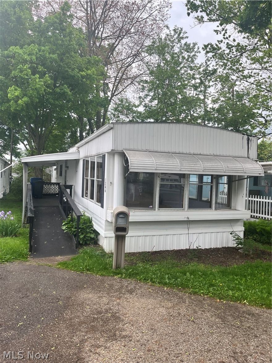 2 Bedroom, 1 Bath Mobile Home located in a desirable 55+ retirement community. This home features forced air heating and central air conditioning for year-round comfort. With great potential and room for your personal touch, this is the perfect opportunity to make it your own. Enjoy peaceful community living in a convenient location in North Canton.