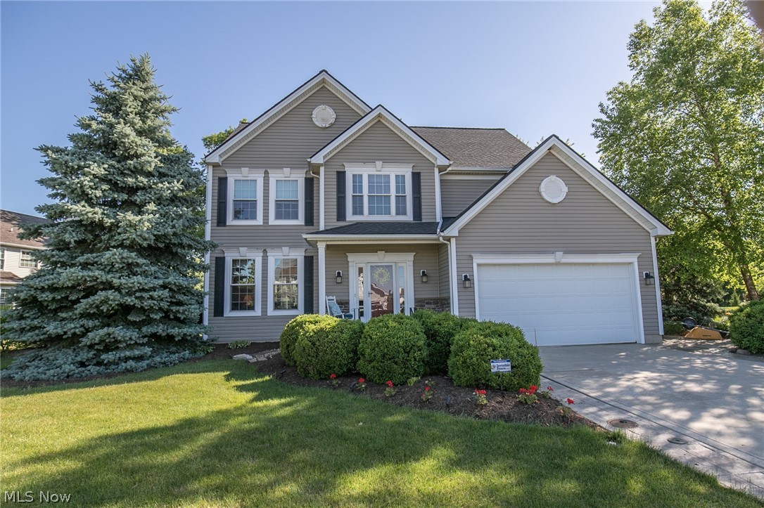 Move right into this gorgeous colonial in Waterside Crossings! Built in 2004, this home has been lovingly cared for and maintained. The 9' ceilings and large windows allow for a very open and bright feel. The eat-in kitchen features hardwood flooring, granite counters, stainless steel appliances, and a center island. The formal dining room, living room, and family room with its gas fireplace make this a great space for entertaining. Half bath conveniently located on the first floor as well as teh laundry room-washer and dryer included! On the second floor you will find the master bedroom with vaulted ceiling, and a private master bath featuring a shower and separate soaking tub, dual sinks, and walk-in closet. Three additional bedrooms and the second full bath all on the second level as well. The finished basement offers tons of extra living space! There is a finished recreation room wtih a wet bar and plenty of storage space. Enjoy the privacy of the beautifully landscaped back yard t
