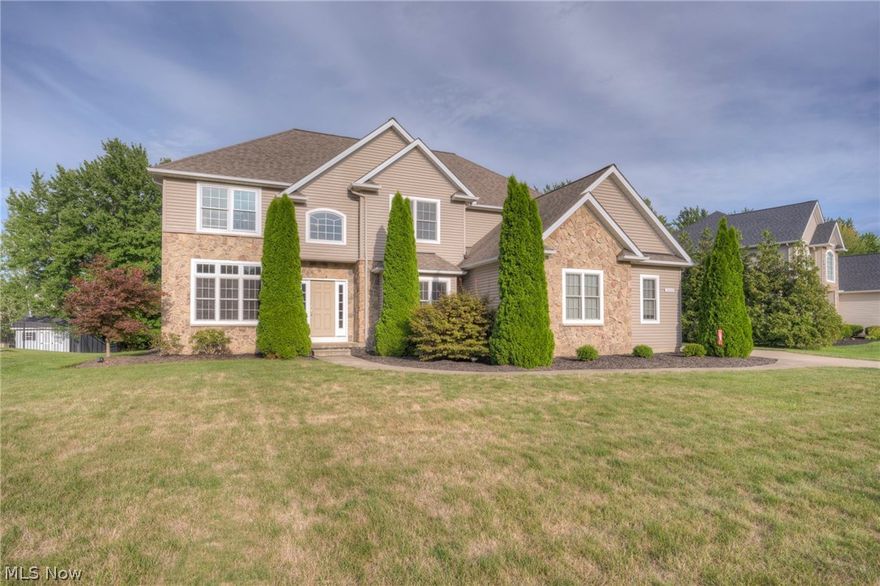 (Full video available) Premium, Custom, Quality "Shafer Built" Magnificent (Rare) 5 Bedroom, 3.5 Bath (Plumbing for additional future bath also) w/Full Mammoth 13 Course (Deep) Basement Situated on an Elegant Quiet No Outlet Street on a Spacious .45 Acre Treed Lot...Pride of ownership will shine through w/recent updates! So much detail w/a true custom home. Beautiful partial stone elevation w/side load 3 car garage (unique double doors to home) & a one of a kind private/treed backyard w/newer stamped concrete patio. Enter to a grand foyer, dual staircases, newer hardwood floors, 9ft ceilings, transom windows, arched openings...Nice! Kitchen has been remodeled w/high end appliances, granite, walk in pantry,  furniture quality butcher block center island w/custom backsplash & refinished wood floors...Formal dining w/lighted tray for a dramatic touch & also open to the family room, loaded w/windows & romantic fireplace. 1st flr den/living room. 1st flr private closed off laundry, Owner's