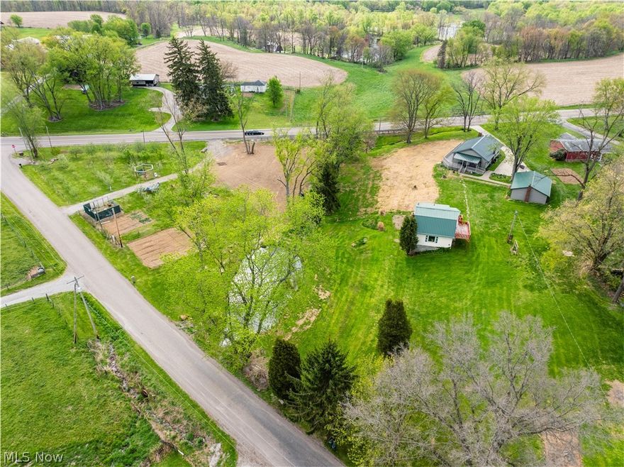 Live Auction May 26th., Here's a solid 3 BR 1 ½ Bath Home in the Country that you'll want to pursue. The home has an eat-in Kitchen, Large Living Room w/ a wood burner, 3 Bedrooms, a Handicap full Bath & a ½ Bath on the main floor, there’s a walkout basement with a shower, plus a huge vinyl Deck to enjoy. The property has a detached Garage w/gas & elec. As well as a shop building with storage in the basement (that could be a horse barn) and an upstairs apartment for your guesthouse. The property has Dundee water and a new septic. It also has a small orchard and an RV hookup. Both Parcels front on Pleasant Hill Rd and SR 93.   
please view our auction site for complete details.