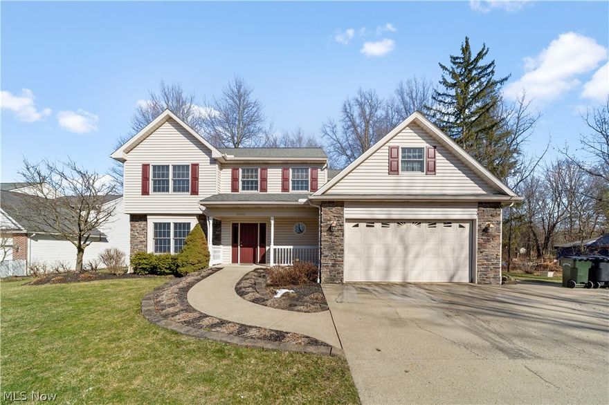 Fall in love with this beautifully maintained custom built home situated on a private wooded lot with an endless list of features.  This 4 bedroom, 2.5 bath home is enhanced with a front porch, accented with stone and very well planned outdoor living space.  All that have been carefully designed to provide premium use for accessibility, living and entertaining. With just over 3000 square feet you have plenty of space for your family or guests. The lower level features over 750 square feet of additional recreation space.  Some of the most notable features in this home include: A private elevator accessible to all 3 levels, custom oak trim throughout, custom built desks, whole house water filter system, extended driveway, and garage heater.  This home also has many wheelchair friendly spaces that include a garage ramp, half bath on first floor, sloped sidewalks to front and rear door, as well as some kitchen counter spaces. This absolute stunner is just moments to restaurants, schools, s