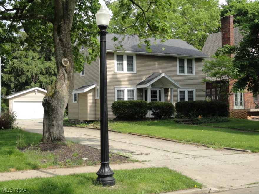 Charming Colonial in desirable Akron neighborhood. Beautiful hardwood floors throughout. Foyer entry, spacious formal living room with fireplace, formal dining room, plus a first floor sunroom which could be converted to a bedroom! Spacious kitchen with dinette. Freshly painted with neutral colors throughout. Updated windows, electric, and furnace. Two-car garage. Lovely home!