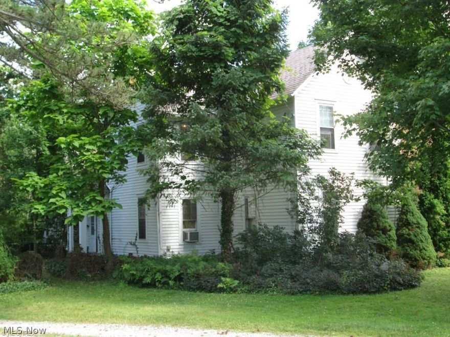 Known as the Riley House. Built in 1865. Located in historic district. Zoning inspector has indicated that this dwelling could be used as a two unit -but would be a non-conforming use. Could be a very gracious home with significant renovation. Basement opens out on ground level at rear of home and provides 2 garage parking spaces. Driveway cannot be blocked as dwelling to rear of this one has an easement to use the drive for ingress and egress. Most buyers would want to redo9 kitchen & baths-put in all new windows-update plumbing-consolidate electrical boxes in basement-& repair/replace sagging plaster through-out the dwelling.