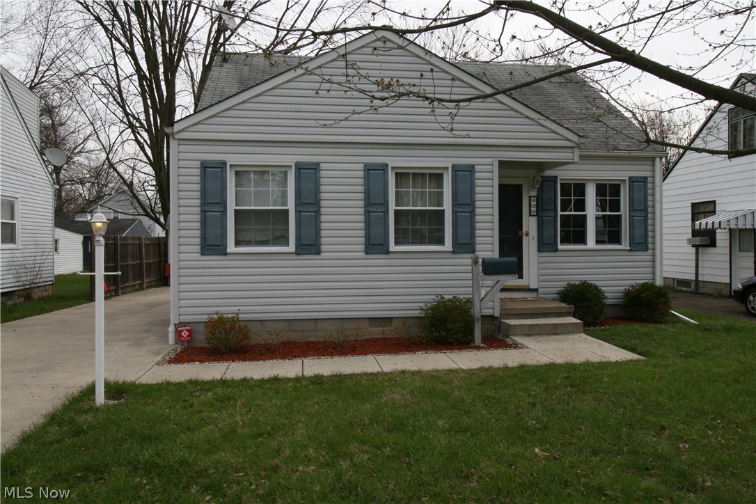 Absolutely spotless and updated to save you thousands! All appliances included! This home features 2 bedrooms and full bath on the first floor with a spacious master bedroom on the upper floor with a walk-in closet and extra storage areas. Nice sized living room with open dining room and updated kitchen, all freshly painted in today's modern colors. Hardwood floors through out the first floor. Finished basement was waterproofed (lifetime warranty) and divided up into a HUGE family room w/decorativce fireplace and projector, office/fitness area, laundry room with storage area. Ceiling fans in all bedrooms. Vinyl windows/siding in '11, roof new in '05-06.