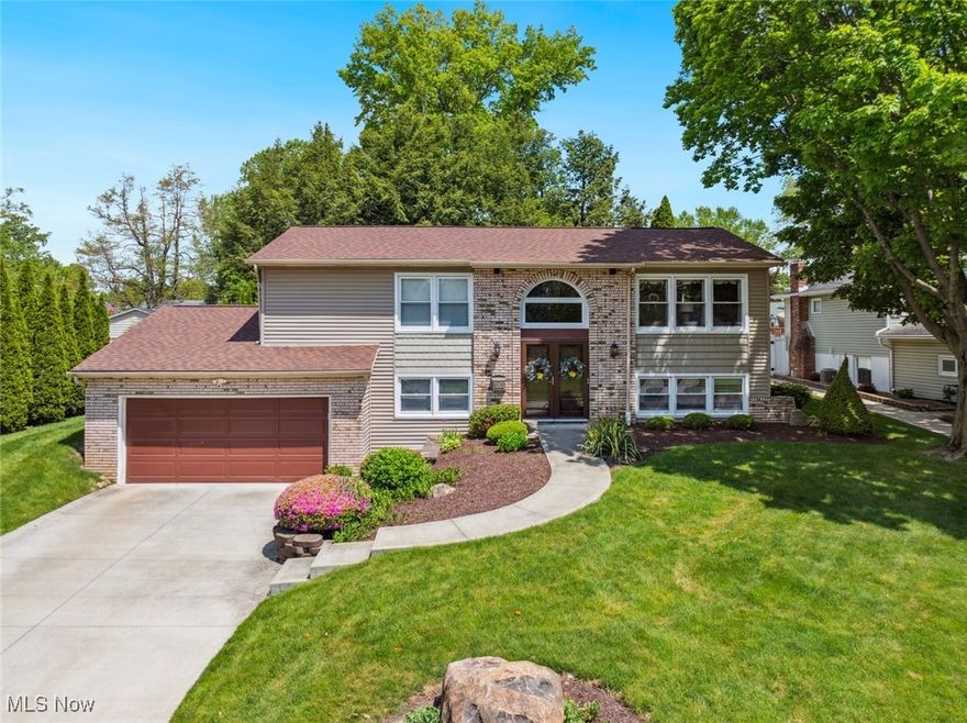 Charming 4-Bedroom Home with Vaulted Ceilings and Park-Like Backyard

Welcome to your dream home! This beautifully maintained 4-bedroom, 2-bathroom residence offers a perfect blend of comfort and elegance. The open floor plan is accentuated by vaulted ceilings and skylights, creating a bright and airy atmosphere throughout the living space. The living room serves as the heart of the home, featuring a cozy gas fireplace that adds warmth and charm. Both full bathrooms have been recently updated with high-end tile finishes, providing a touch of luxury. For those who value storage and convenience, the oversized 2-car garage includes an additional storage area adjacent to the downstairs living room and laundry. Step outside to your private oasis a park-like backyard with a spacious deck, perfect for entertaining or simply enjoying the serene views of the surrounding greenery. Don't miss the opportunity to make this exceptional property your new home!