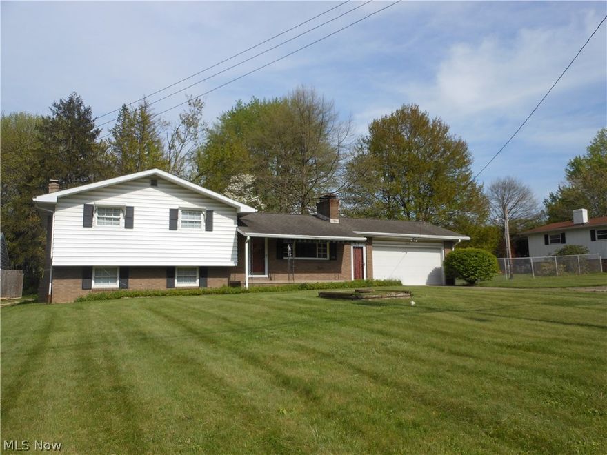 Just reduced- Come see our newer landscaping on this attractive 4 level split. This is a one owner home located in Hubbard Township on two lots offering a Living Room w/FP, Kitchen, Dining Area, Family Room & Enclosed Sunroom on the 1st Floor.  The 2nd Floor has 3 Bedrooms & Full Bath.  The lower level is a large Family Rm/Rec Room w/FP.  The basement has a 1/2 bath, fruit cellar & direct access to the garage.  Outside there is a large fenced in backyard w/shed.  There are beautiful recently refinished hardwood flrs in the Living Rm, Dining Area & the 3 bedrooms.  Updates include: electrical updated to 200 amp service, newer windows, newer furnace & updated boiler (4 yrs.) The hardwood floors have recently been refinished & the exterior recently painted. Special features include two Fireplaces, fenced in backyard, house generator, whole house fan & much more. Kitchen stove & Liv Rm FP posts are excluded.   Pre-Approved buyers only.