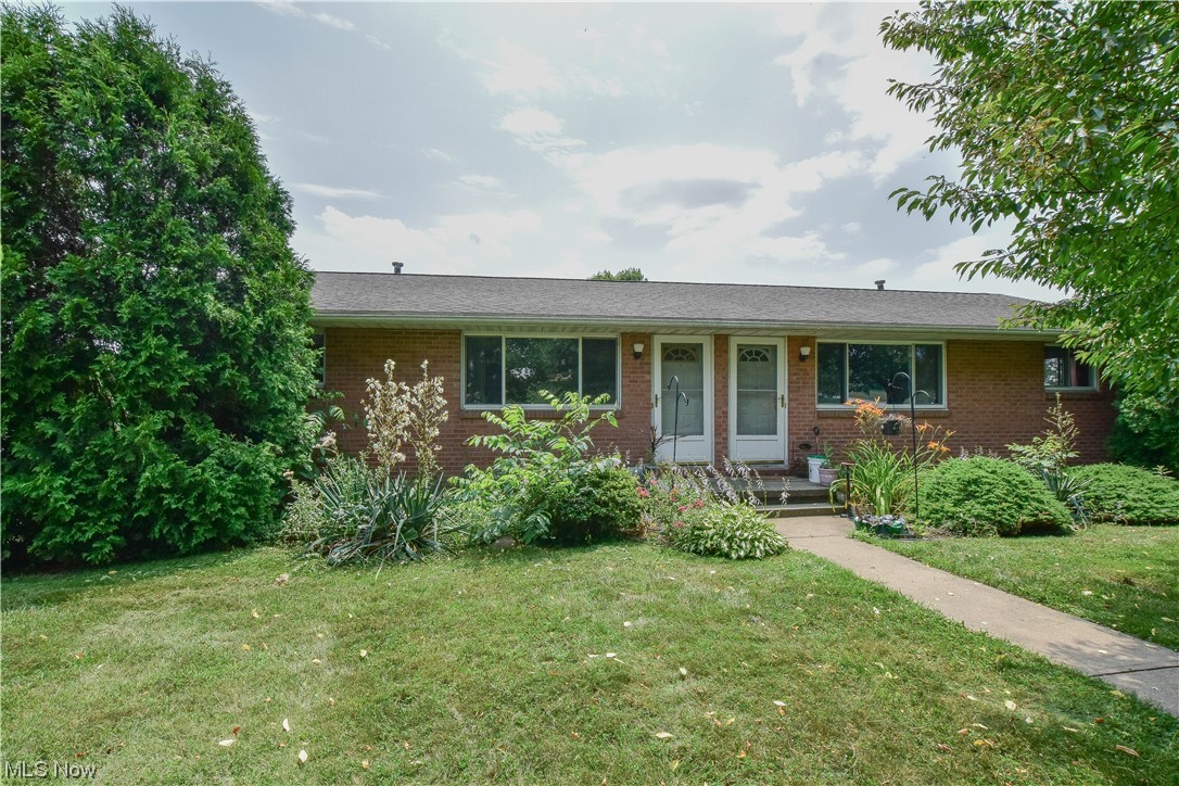Whether you're looking for an investment opportunity or the perfect owner-occupied residence, this all brick duplex is a great find! Situated on a corner lot, the property enjoys a wonderful view of the private community lake. Each unit features a spacious living room, eat-in kitchen, two bedrooms and a full bath. The undermount garage areas offer private parking plus storage and laundry in each partial basement. Live on one side and have rental income to offset your mortgage or purchase as an investment with the potential revenue of $2000 per month. Please note, this sale is as-is with the seller unable to make repairs. Call today!