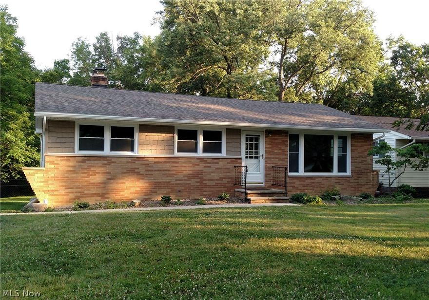 Just like a new home... but at a much lower price! Just walk-in and you will fall in love with this completely renovated Ranch style home with 4 bedrooms and 2 full baths. As you enter, the gleaming hardwood floors and bright open floor plan greet you. The Gourmet Kitchen overlooks the Dining and Living Rooms and features granite countertops, stainless steel appliances, solid maple cabinets (with soft close) and a Breakfast bar island. The Dining Room has sliders that open to a 2nd floor deck that overlook the backyard. Gorgeous hardwood floors adorn the entire first floor. The first floor living area also has 3 bedrooms and full bathrooms with granite counters, new cabs, and fixtures. The lower level living area has a walk-out basement and large fourth bedroom (or optional family room). The lower level also has an additional full bath with walk-in shower, granite vanity, and all new fixtures . Brand new updates include: new Furnace, Roof/Gutters, Vinyl siding, all new Windows, Light f