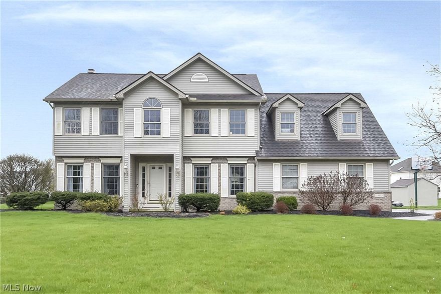 Stunning colonial home located in the heart of Avon, within the exclusive Summer Hill community. This home is minutes away from the highway, making your travels convenient. As you walk through the front door, you will be greeted by a gorgeous 2-story foyer with a main level that features an open-concept with brand new oak luxury vinyl flooring running throughout the entire main floor giving it one, cohesive, high-end look and feel. The large eat-in kitchen that was completely redone last year. It comes complete with shaker white cabinets, granite countertops, tile backsplash, updated lighting, new appliances, and finished off with a good-sized pantry for additional storage. The kitchen opens up into the oversized great room with plenty of room to entertain and a beautiful, modern fireplace. As you continue to move around the first floor, you will find a spacious office, a formal dining room, powder room, and a conveniently located first floor laundry room. Moving up to the second floor you will find all 4 bedrooms and 2 full baths. All of the bedrooms have had custom closet systems installed in them last year, including the master bedroom. The master bedroom as well as one of the spare bedrooms have vaulted ceilings, elevating the spaces making them feel even bigger. The master bedroom is complete with a large walk-in closet and ensuite bathroom that contains a shower as well as a soaker tub. The basement is finished adding additional living space for entertaining, an office, rec room, or gym! When you step out into the backyard, you'll find a massive patio that spills out into an enormous backyard big enough for any activities you can think of and still far enough away from all of the neighbors to enjoy some privacy. This has been beautifully maintained and updated with neutral colors, perfect for making it your own!