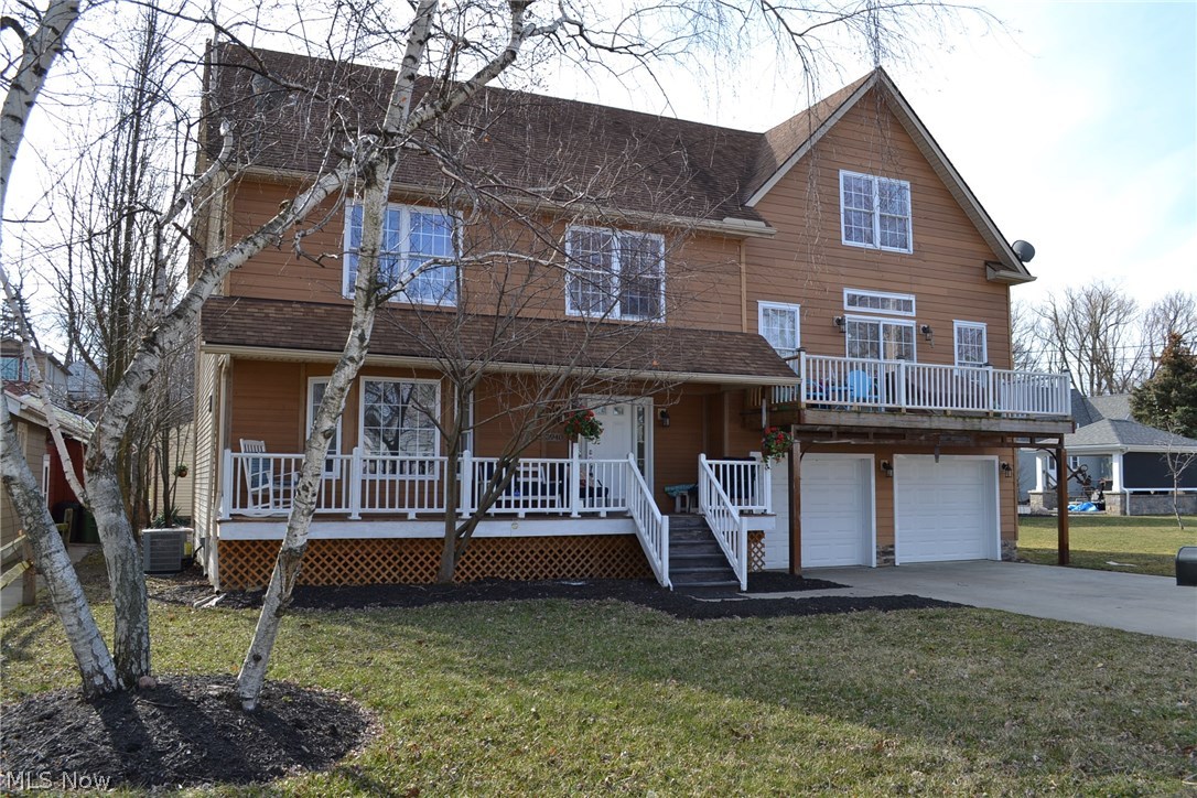 Completely updated, Newer 4 bdrm, 3 bath home with views of Lake Erie! Beach and Chagrin River access with possible dock space for rent. Tucked away in a quiet community. Stunning & Modern open floor plan with 4 levels of living space including exterior decks or balcony access on 3 floors!! Brand new white & gray contemporary style kitchen with porcelain floors and granite counters. Many recent updates include a beach look laminate flooring throughout with porcelain floors in all baths & laundry. All the plumbing is brand new. High efficiency Central Air Unit in 2017. New interior doors, light fixtures, garage doors, hot water tank. The cedar look siding is a cement mix with no maintanance needed. Very impressive and stylish home!!