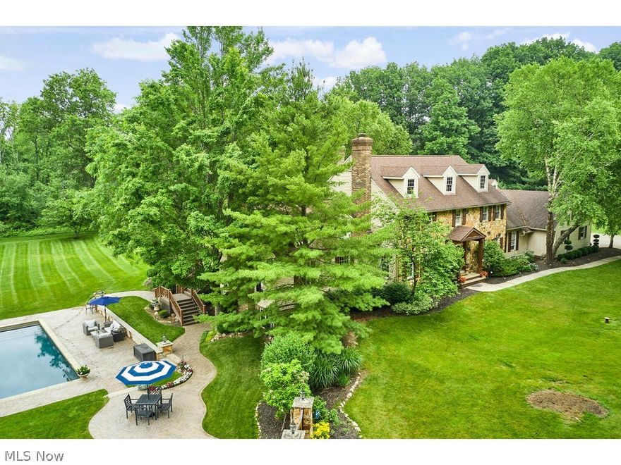 This one won't last long! This totally Renovated 5 Bedroom, 4.5 Bath Home with Resort Style Salt Water Pool on Private 3+ Acre Lot, is the perfect home for entertaining! The new kitchen features an 11-foot long granite island, ultra-premium appliances, & butler's pantry! 1st floor also features incredible Great room w/floor to ceiling stone fireplace, skylights, beamed ceiling, and door to the highlight of this amazing home, the outdoor living space. Large deck w/stairs to incredible pool, pond, large flat backyard, & large deck w/built-in hot tub. Sunroom w/floor to ceiling windows, slider to deck, & skylights. Dining room w/woodburning fireplace & private office w/ FP & slider to deck. Additional living suite, large laundry/mud room, living room, & half bath complete the first floor. Second floor master has a stunning master bath w/Jacuzzi tub, dressing table area, and also 11-foot high vaulted ceiling. 3 additional bedrooms & 2 newly renovated baths complete the second floor. Walkout Lower Level. Set on cul-de-sac, it also features a 3 car attached, 9 car detached garage. Check out the 360 Virtual Tour.